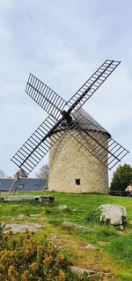 View of windmill on field