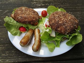 Close-up of hamburger in plate on table