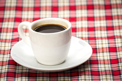 Coffee cup on table