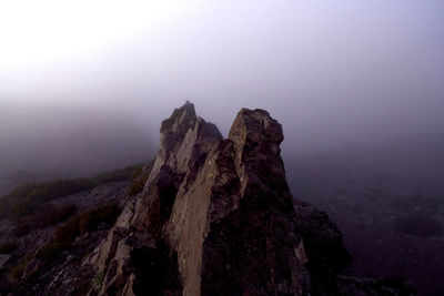 Scenic view of rocky mountains against sky