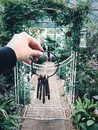 Close-up of woman holding old keys