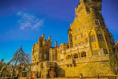 Low angle view of historic building against sky