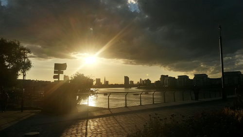 Sun shining through buildings