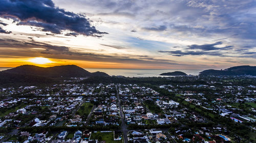 High angle view of cityscape against sky during sunset