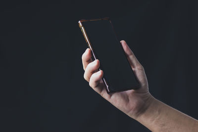 Social media technology concept, men's hands using smartphones to login social media, work from home 