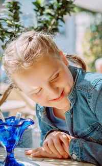 Portrait of young smiling girl