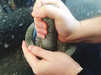 Cropped image of hand holding water