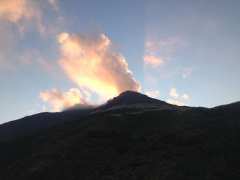 Scenic view of mountains against sky during sunset