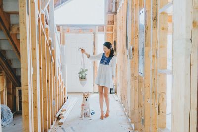 Woman standing in corridor