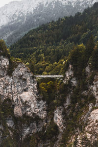 Scenic view of bridge and mountains