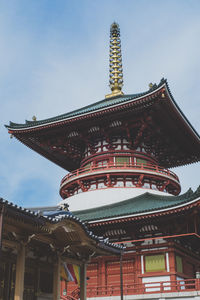 Low angle view of temple building against sky