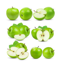 Close-up of apples on green background