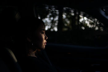 PORTRAIT OF GIRL IN CAR