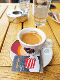 High angle view of coffee cup on table