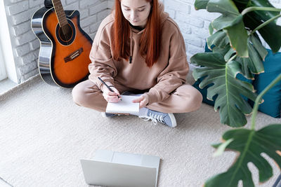 Young woman using laptop