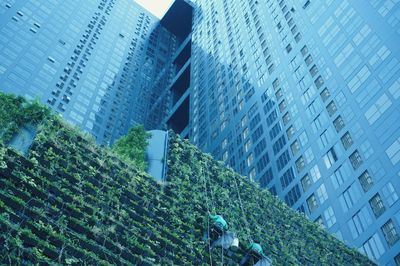 Low angle view of modern buildings in city