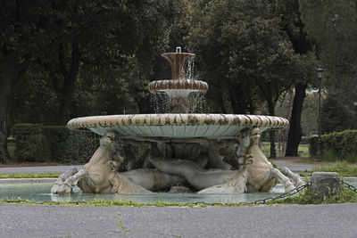 Fountain of the sea horses in villa borghese gardens in rome, italy