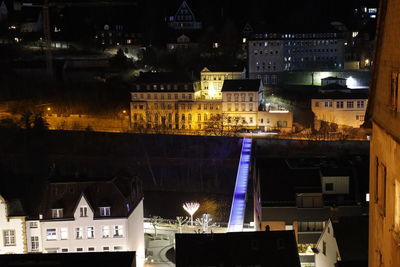 High angle view of buildings at night