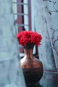 Close-up of red flower pot