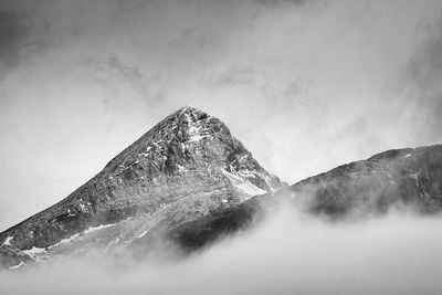 View of mountain during foggy weather