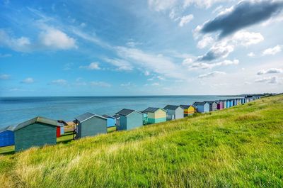 Scenic view of beach against sky