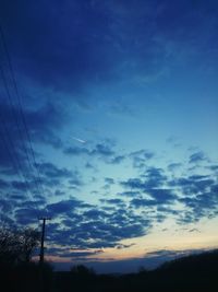 Scenic view of landscape against cloudy sky