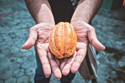 Close-up of man holding ice cream