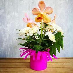 Close-up of flower vase on table