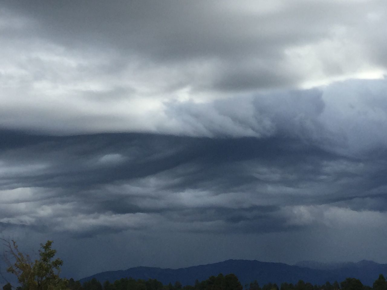 LOW ANGLE VIEW OF STORM CLOUDS