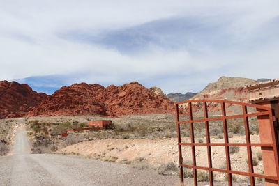 Scenic view of landscape and mountains against sky