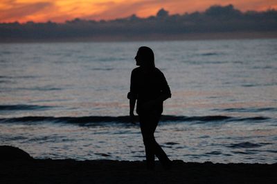 Silhouette of people on beach