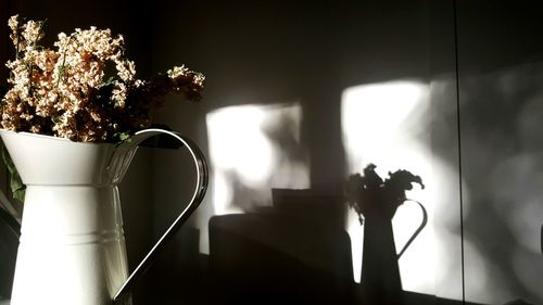 Flower vase on table