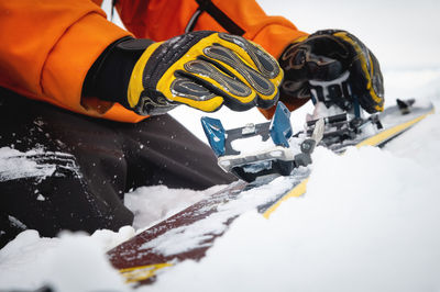 A close-up of the ski bindings as they are set up for backcountry skitouring. sports facility skiing