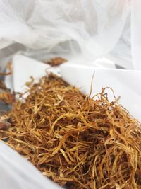 High angle view of rice in container