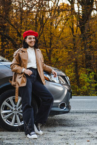 Side view of woman in car