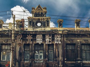 Low angle view of historic building against sky