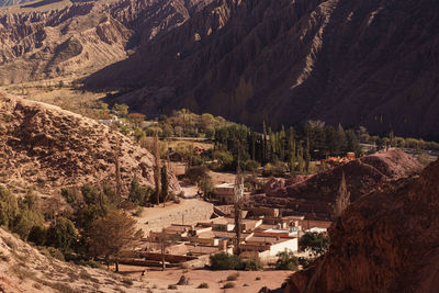 High angle view of townscape and mountains