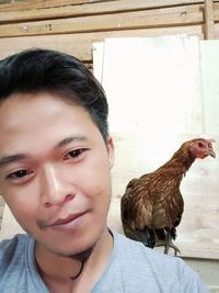 Portrait of young woman with birds