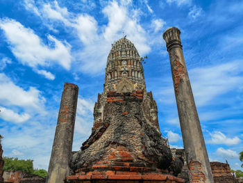 Low angle view of old temple against sky