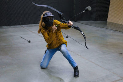 Woman practicing archery