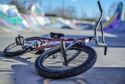 Bicycle fallen at skateboard park