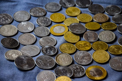 High angle view of coins on table