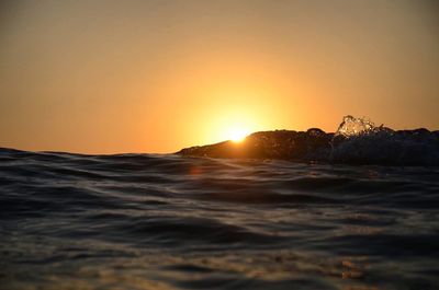 View of calm sea at sunset