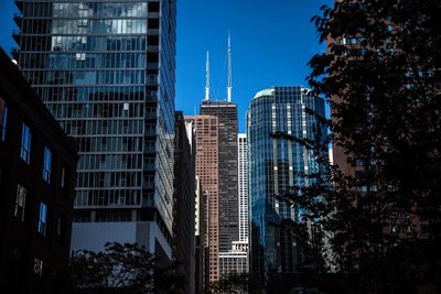 Low angle view of modern buildings in city