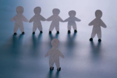 High angle view of people standing on floor