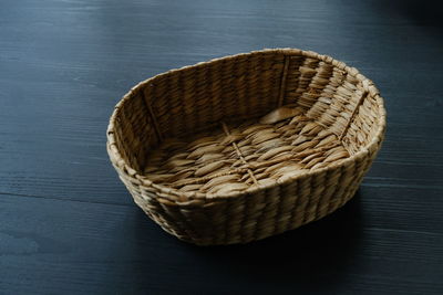 High angle view of wicker basket on table