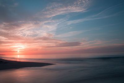 Scenic view of sea at sunset