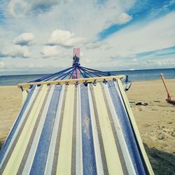 Scenic view of beach against sky