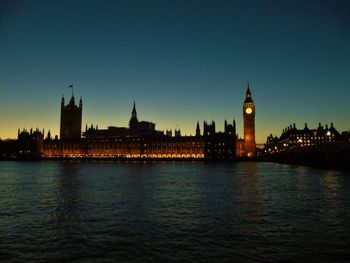 View of illuminated city at waterfront