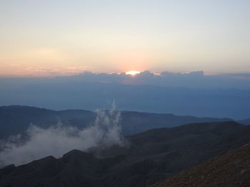 Scenic view of mountain against sky during sunset